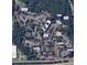 Stunning aerial view of the community showcasing the pool, tennis courts, playground, and convenient parking at 3077 Colonial Way # F, Atlanta, GA 30341