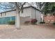 The backyard of this house has lush trees, green grass, a privacy fence, and some brick walls at 3077 Colonial Way # F, Atlanta, GA 30341