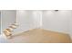 Versatile room with neutral tile, staircase, and ample space for various uses at 3077 Colonial Way # F, Atlanta, GA 30341