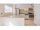 Bright kitchen with granite countertops, stainless steel appliances, and ample cabinet space at 3077 Colonial Way # F, Atlanta, GA 30341