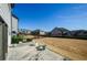 The backyard has a concrete patio and a large lawn at 3815 Pleasant Woods Dr, Cumming, GA 30028