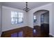 Bright dining room featuring hardwood floors, large window, and chandelier at 3815 Pleasant Woods Dr, Cumming, GA 30028