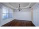 Dining room with wainscoting, wallpaper, and window with light-filtering blinds at 3815 Pleasant Woods Dr, Cumming, GA 30028