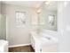 Bathroom with dual sinks and white cabinets at 4751 Lorient Ct, Snellville, GA 30039