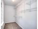 Walk in closet with carpet and closet shelving at 4751 Lorient Ct, Snellville, GA 30039