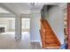 Open foyer with hardwood floors and staircase at 4751 Lorient Ct, Snellville, GA 30039