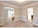 Open floor plan showcases living room with neutral color palette and bright views at 4751 Lorient Ct, Snellville, GA 30039