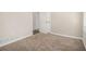 Cozy bedroom with neutral carpeting, white trim, and natural light at 2254 Whites Mill Rd, Decatur, GA 30032