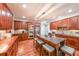 Modern kitchen featuring an island with bar stool seating and high-end stainless steel appliances at 4408 Meadowwood Dr, Loganville, GA 30052