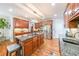 Gourmet kitchen with granite countertops, stainless steel appliances, and a large central island at 4408 Meadowwood Dr, Loganville, GA 30052