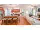 Open kitchen with an island featuring seating, stainless appliances, and seamless access to living spaces at 4408 Meadowwood Dr, Loganville, GA 30052