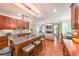 Well-appointed kitchen with bar stool seating, stainless appliances, and open-concept to living spaces at 4408 Meadowwood Dr, Loganville, GA 30052