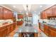 Beautiful kitchen with hardwood floors, custom cabinetry, and modern stainless steel appliances at 4408 Meadowwood Dr, Loganville, GA 30052