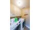 Laundry room with neutral paint, front load washer and dryer, and storage at 4408 Meadowwood Dr, Loganville, GA 30052