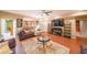 Spacious living room featuring hardwood floors and comfortable seating at 4408 Meadowwood Dr, Loganville, GA 30052