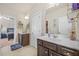 Bright bathroom showcasing double sinks, generous counter space, and dark wood cabinetry at 4826 Ralin Ct, Atlanta, GA 30331