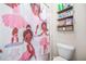 Bathroom with a toilet next to a ballerina-themed shower curtain at 4826 Ralin Ct, Atlanta, GA 30331