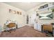 Craft room with dual desks, sewing machine, and a TV at 4826 Ralin Ct, Atlanta, GA 30331