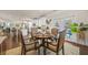 Charming breakfast nook with a round table, four chairs, and adjacent to the kitchen and outdoor view at 4826 Ralin Ct, Atlanta, GA 30331