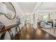 Bright foyer with hardwood floors, decorative console table, and open view into other living areas at 4826 Ralin Ct, Atlanta, GA 30331