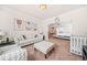 Open-concept living room featuring a comfortable couch and access to other living areas at 4826 Ralin Ct, Atlanta, GA 30331