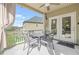 Covered patio showing table and chairs with view of the backyard at 4826 Ralin Ct, Atlanta, GA 30331