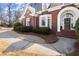 Close-up of the front entrance, showcasing the arched doorway and walkway at 2758 Chieftain Run, Duluth, GA 30097