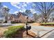 Attractive brick home with driveway, and mailbox showcasing curb appeal and classic design at 2758 Chieftain Run, Duluth, GA 30097