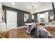 Modern home office featuring stylish desk, a hide rug, and ample natural light at 2758 Chieftain Run, Duluth, GA 30097