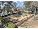 Community playground nestled amongst beautiful trees makes it perfect for enjoying nature and staying active at 2758 Chieftain Run, Duluth, GA 30097