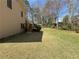 Large grassy backyard with a view of the deck at 2917 High Brook Se Way, Conyers, GA 30094