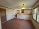 Sunny dining room with tile flooring and a chandelier at 2917 High Brook Se Way, Conyers, GA 30094