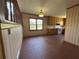 Bright kitchen area with wood cabinets and a window overlooking the backyard at 2917 High Brook Se Way, Conyers, GA 30094