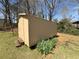 Side view of the backyard storage shed at 2917 High Brook Se Way, Conyers, GA 30094