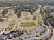 Aerial view of the house showing the golf course near the community at 700 Clubside Dr, Roswell, GA 30076