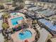 Aerial view of the community showing the tennis court and swimming pools at 700 Clubside Dr, Roswell, GA 30076