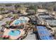 Aerial view of the community showing the tennis court and swimming pools at 700 Clubside Dr, Roswell, GA 30076