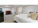 Bedroom with neutral carpet, a metal bed frame, dresser, and an aquarium at 700 Clubside Dr, Roswell, GA 30076