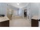 Bright and spacious main bathroom featuring a separate shower, tub, and dual vanities at 700 Clubside Dr, Roswell, GA 30076