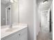 Bathroom features a white vanity and tile floors at 1976 Hedge Brooke Nw Trl, Acworth, GA 30101