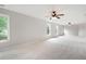Large bonus room with neutral walls, carpet and multiple windows at 1976 Hedge Brooke Nw Trl, Acworth, GA 30101