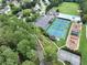 Aerial view showcasing community amenities, including the pool, courts, and park at 1976 Hedge Brooke Nw Trl, Acworth, GA 30101