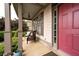 Charming covered porch with seating, perfect for enjoying the outdoors at 1976 Hedge Brooke Nw Trl, Acworth, GA 30101