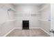 Walk-in closet with carpet, shelving, and center cabinet with drawers at 1976 Hedge Brooke Nw Trl, Acworth, GA 30101