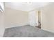 Cozy bedroom with neutral walls and carpeted floor at 3409 Glensford Dr, Decatur, GA 30032