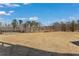 Expansive backyard with newly laid sod, offering a blank canvas for outdoor enjoyment at 162 Spaulding Ln, Woodstock, GA 30188