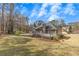 Beautiful backyard with deck and lawn perfect for outdoor entertaining at 3031 Clove Tree Ln, Woodstock, GA 30189