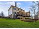 Expansive backyard featuring a multi-level deck perfect for outdoor entertaining at 3845 Williams Point Dr, Cumming, GA 30028