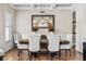 Elegant dining room featuring a stylish mirror and an ornamental pendant lighting at 3845 Williams Point Dr, Cumming, GA 30028