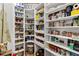 Walk-in pantry featuring custom shelving and organization system at 3845 Williams Point Dr, Cumming, GA 30028